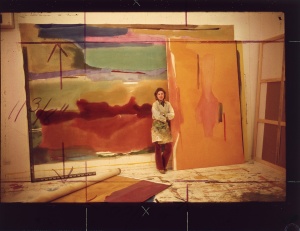 Helen Frankenthaler with one of her paintings